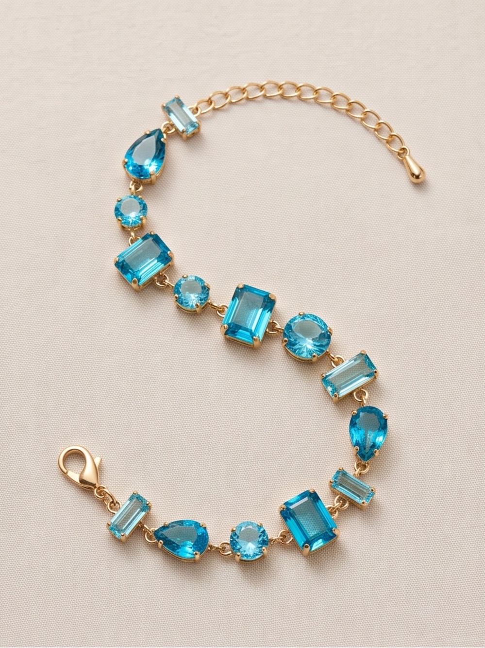 Gold Plated Multi-Cut Aquamarine Blue Cubic Zirconia Statement Bracelet